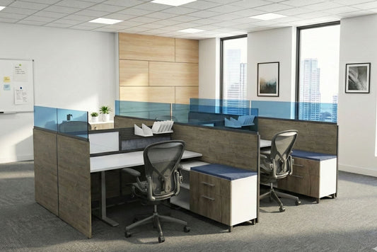 Modern office setup with desks, chairs, and glass partitions.
