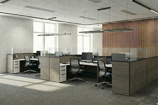 Modern office space with wooden desks and glass partitions.