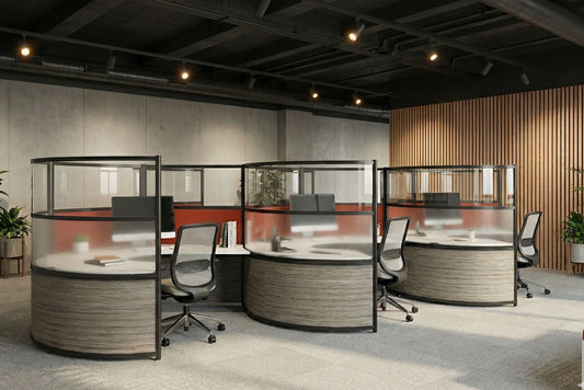 Modern office space with round workstations and glass partitions.