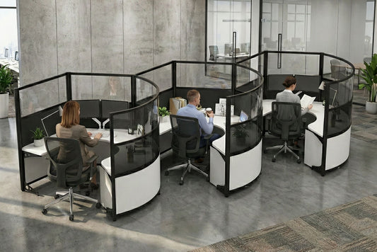 Modern office layout with partitioned round workstations and employees working.