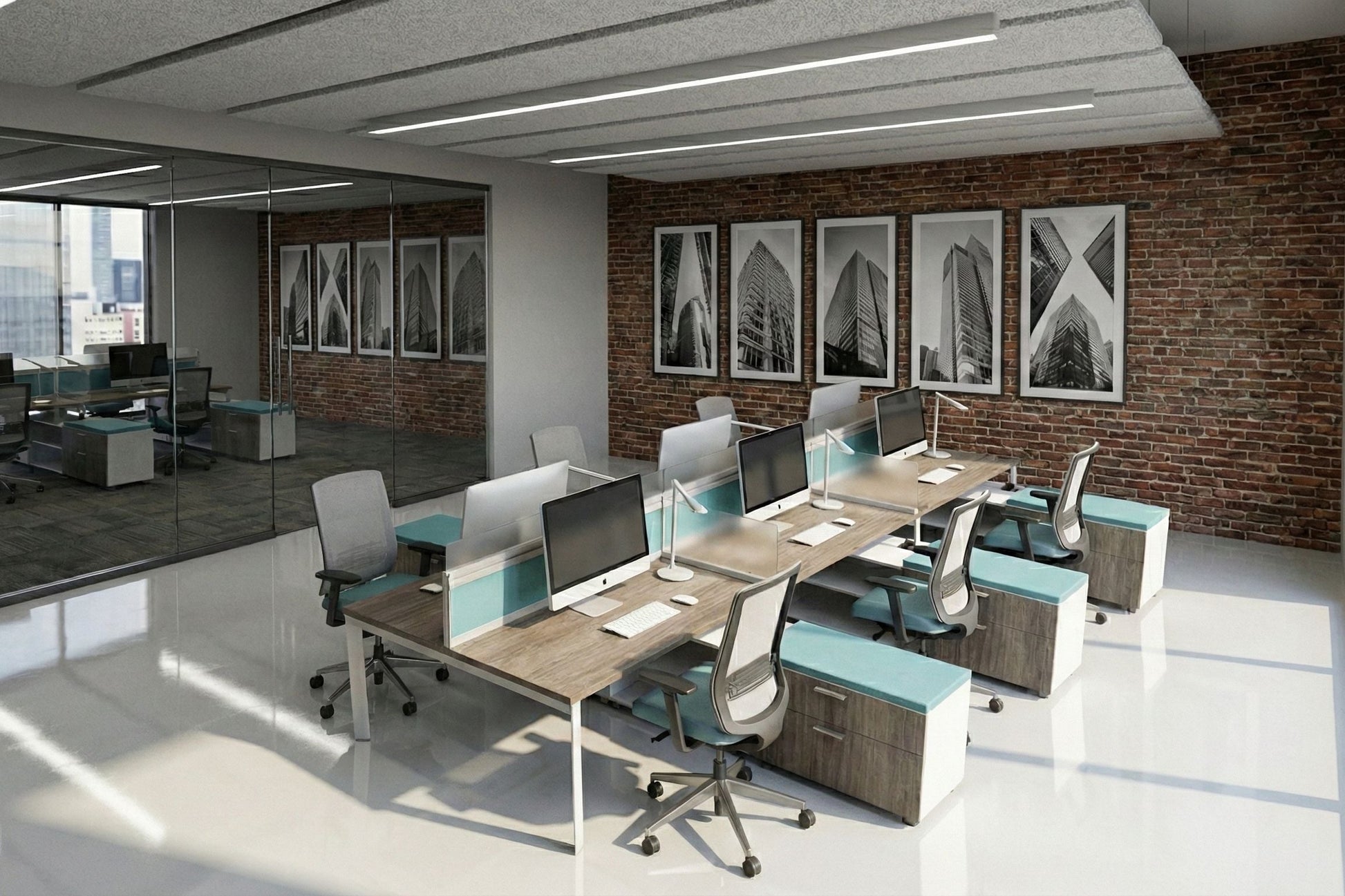 Modern office benching space with desks, chairs, and large windows.