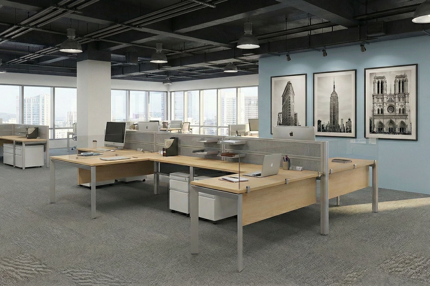 Modern open plan office space with large desks, chairs, and city views.
