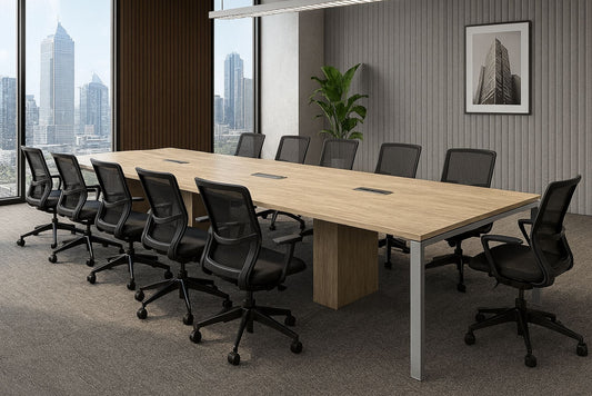 Modern conference room with a long wooden table and black chairs, large windows with cityscape view.