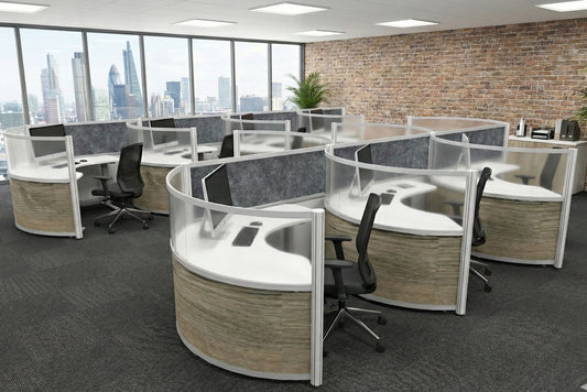 Modern office layout with round workstations and chairs in a well-lit room.