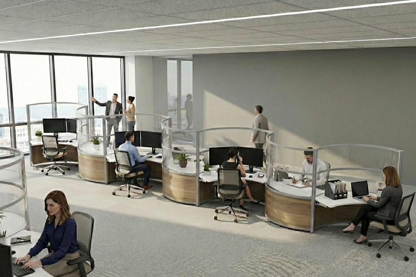 Modern office space with employees working at their desks.