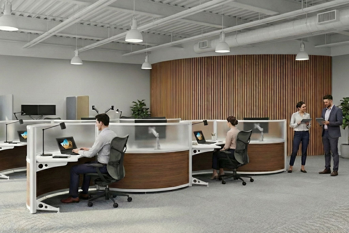 Modern office space with employees working at their desks.