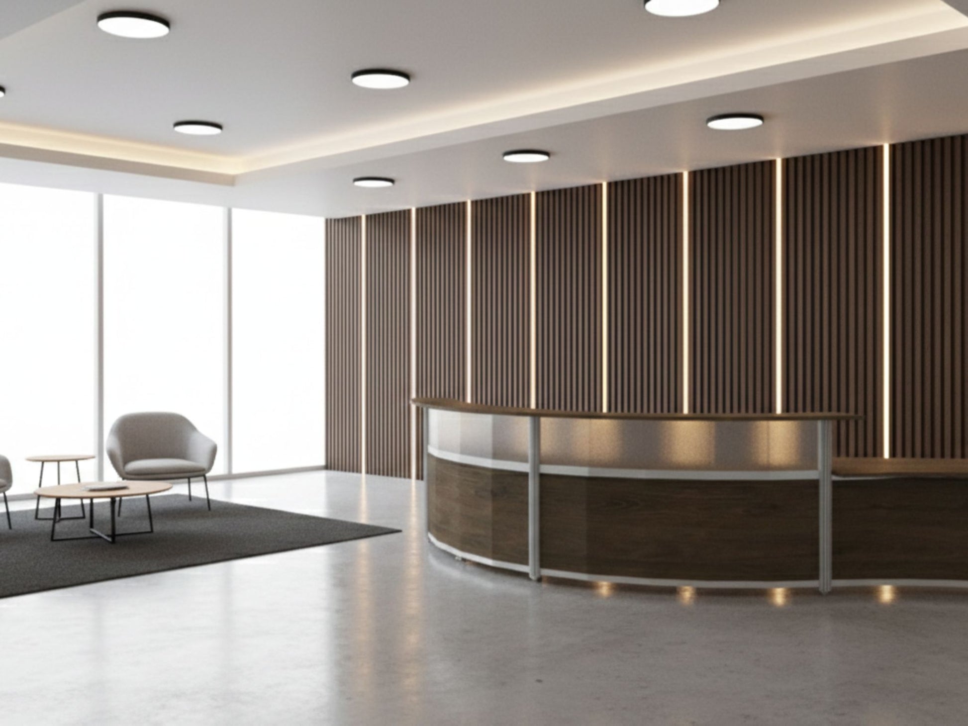 Modern office lobby with round reception desk and seating area