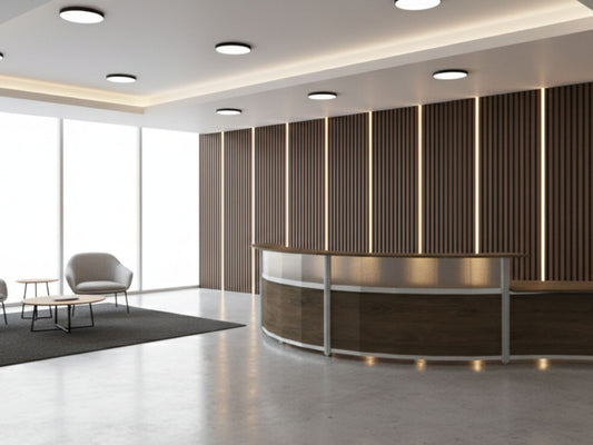 Modern office lobby with round reception desk and seating area