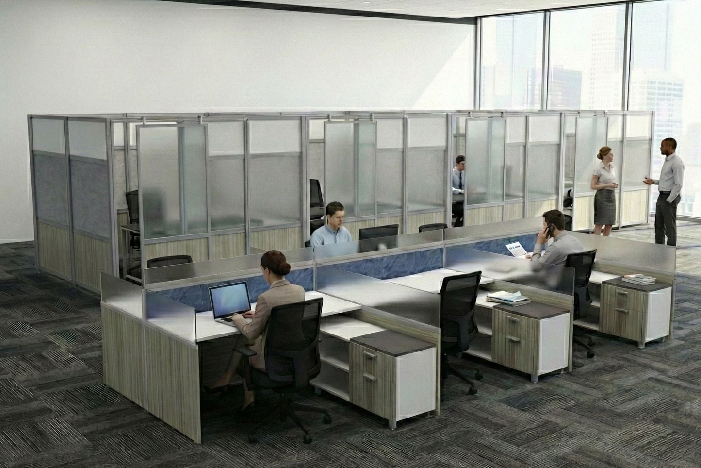 Modern office layout with glass partitions and employees working.