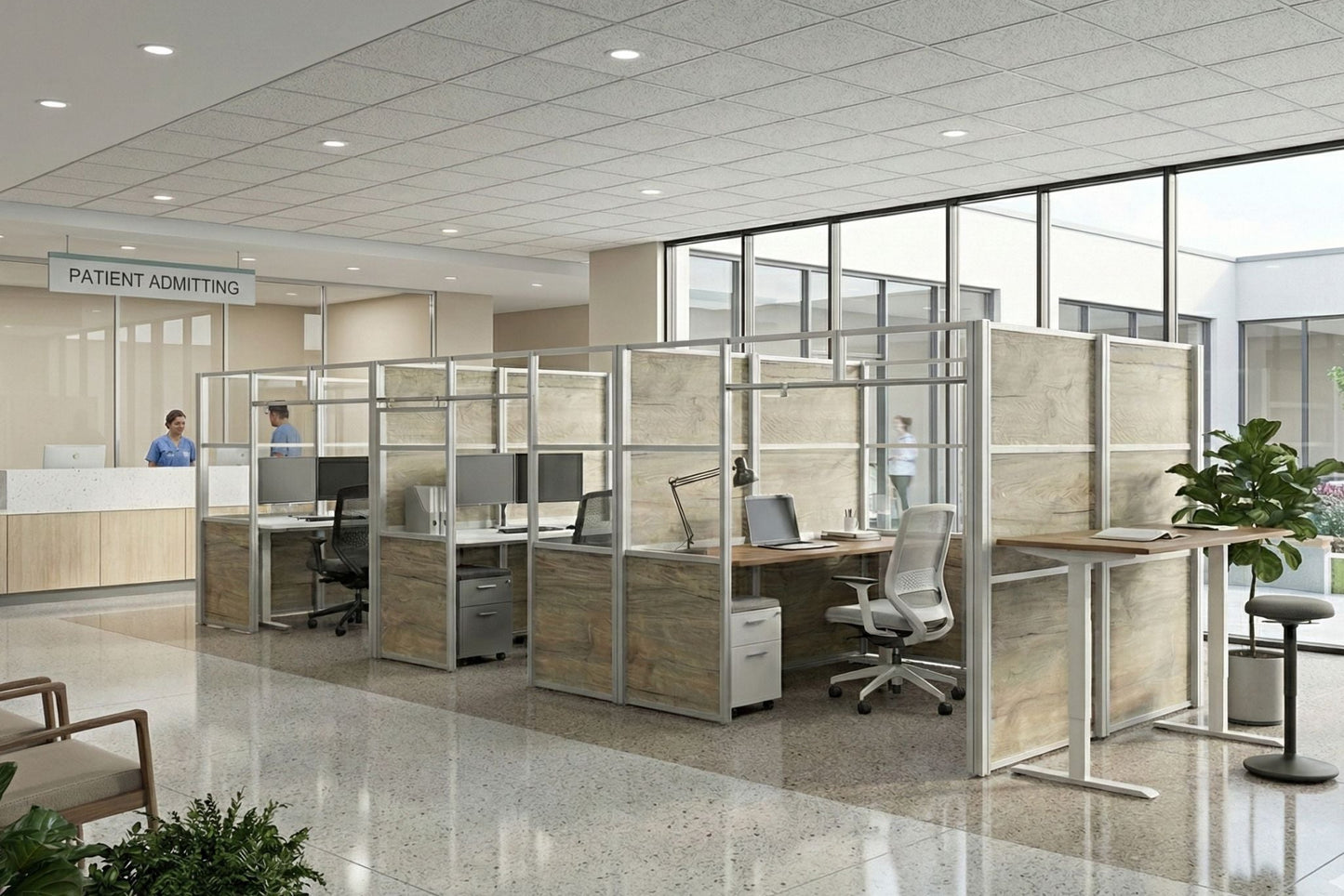 Modern office interior with glass partitioned workstations and a patient admitting area.