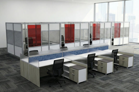 Modern office layout with workstations and glass partitions.