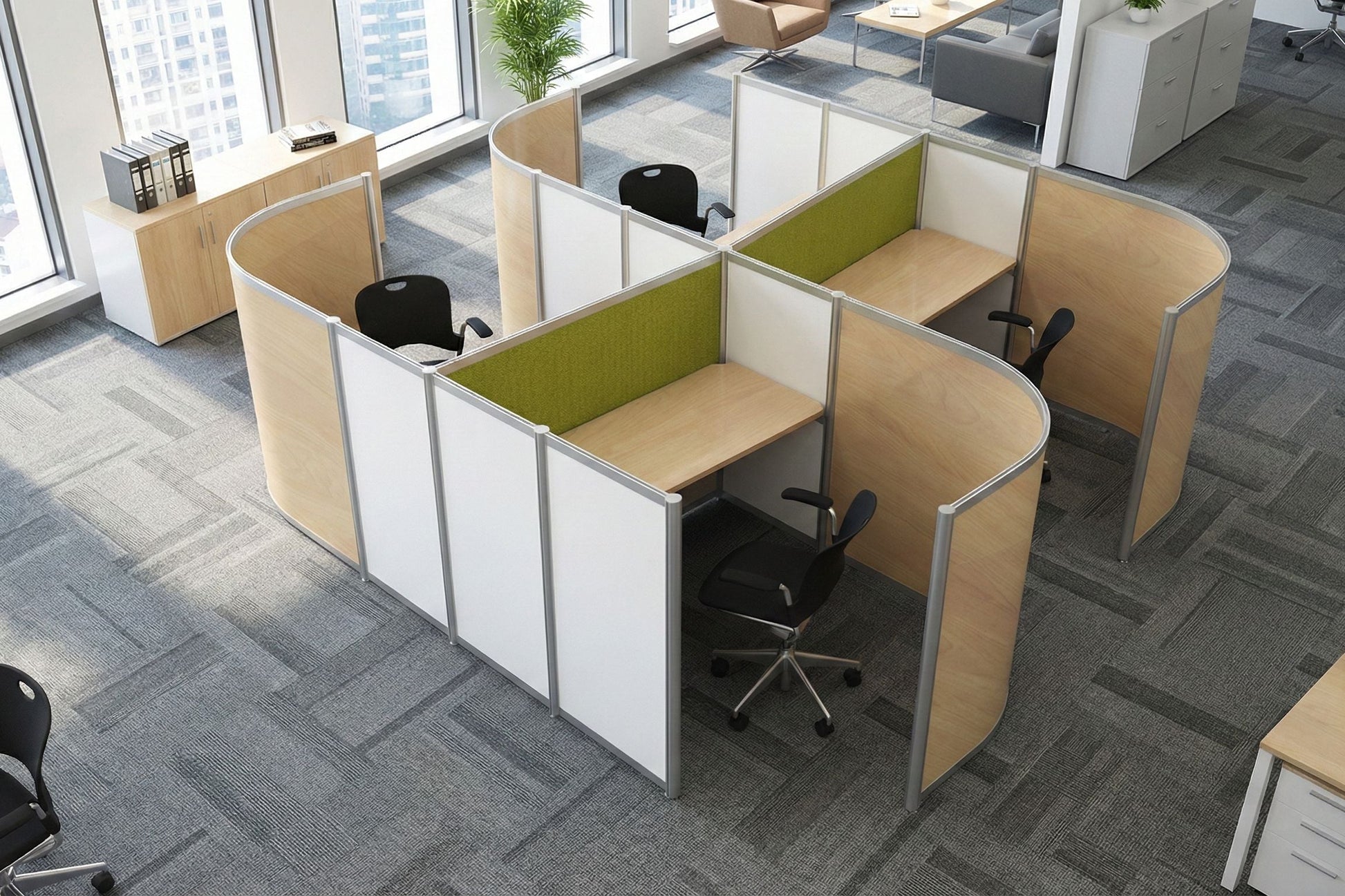 Modern office layout with curved office desks and chairs in a bright room.
