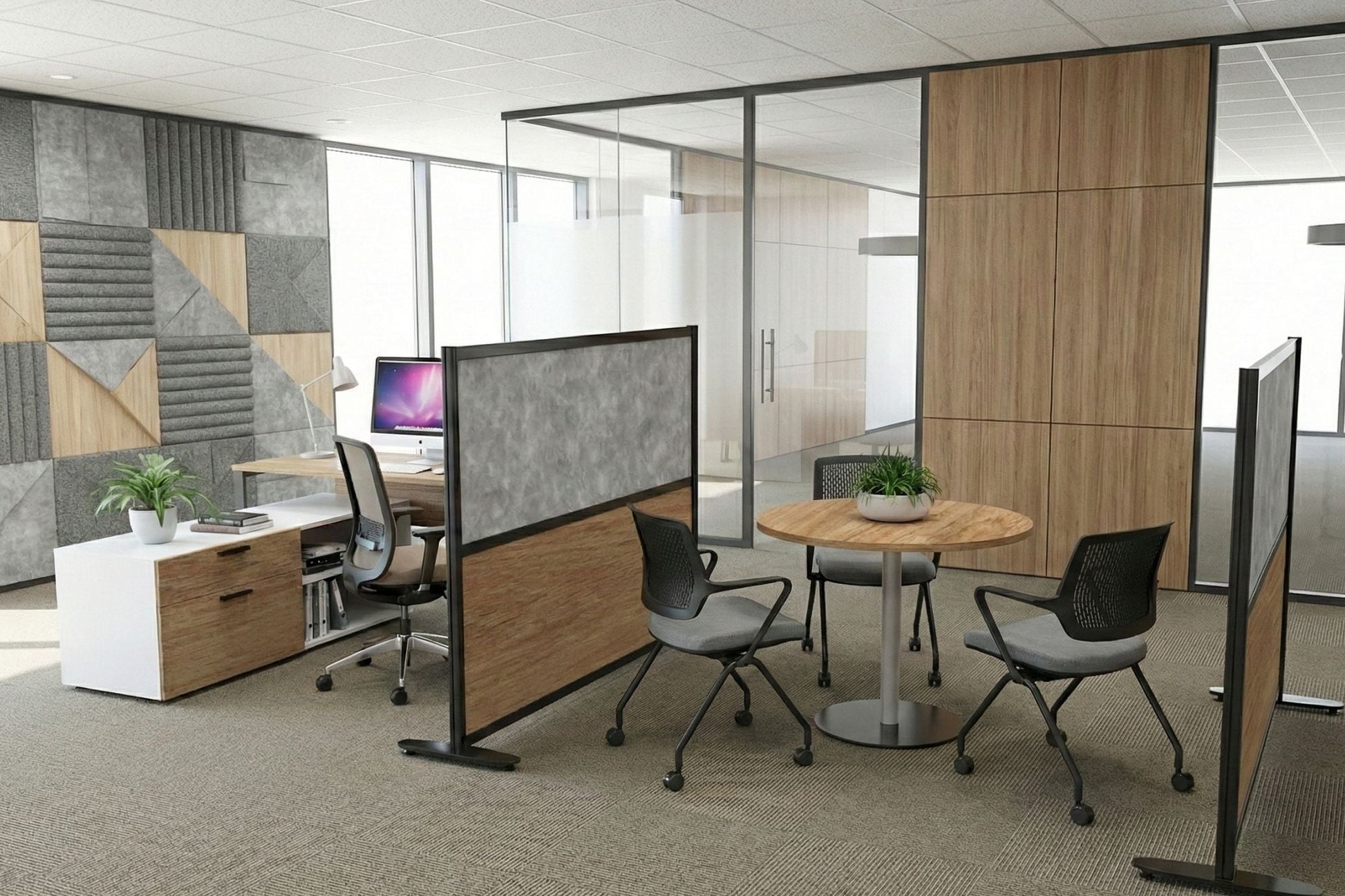 Modern office space with glass partitions and office furniture.
